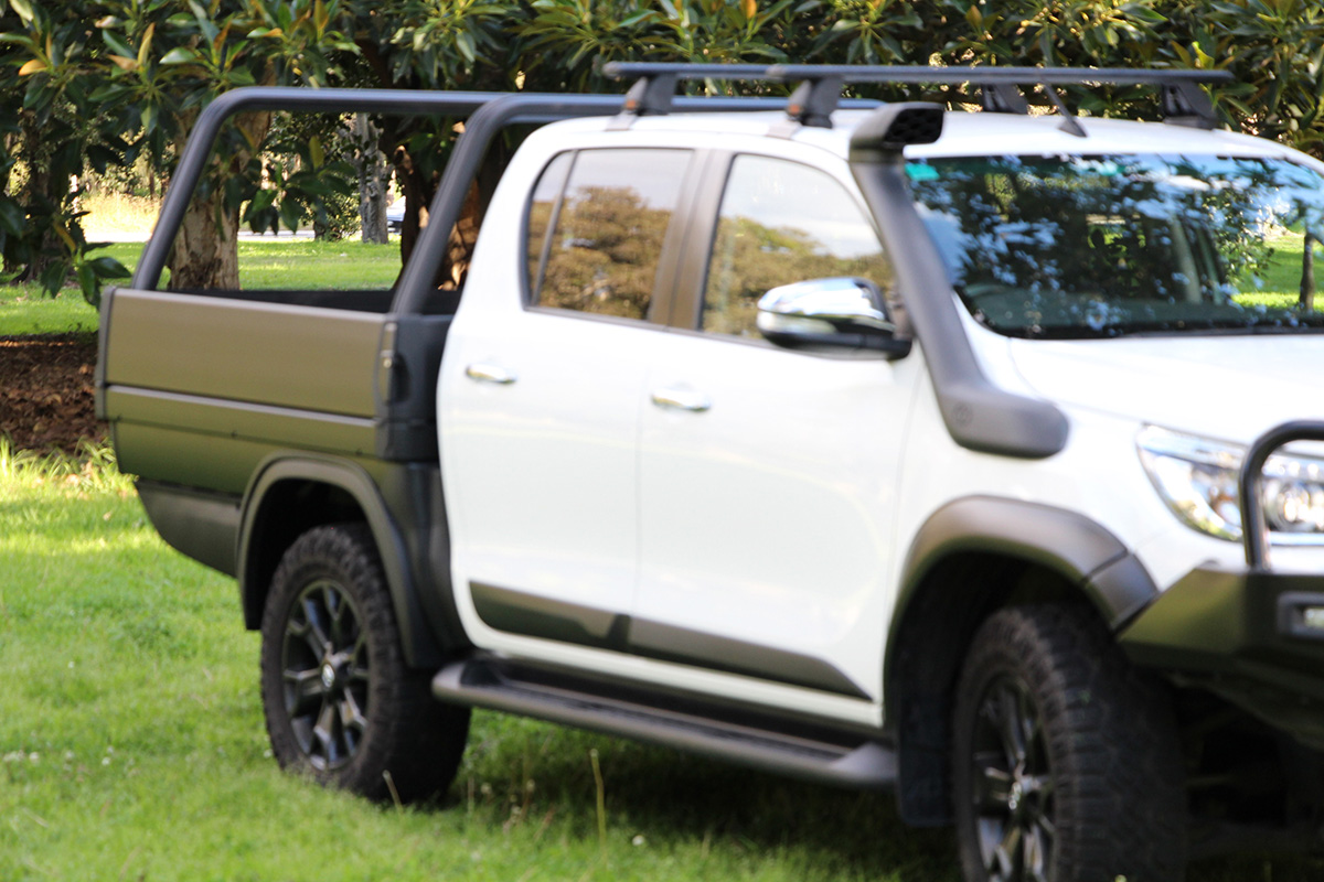 White Toyota HiLux with matte black Sport Utility Bed